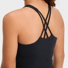 Why we're ALL IN: Fitted tank top with a pullover design, U-neckline and cropped cut. Crafted from recycled polyester with spandex and features quick-drying, moisture-wicking properties to keep them feeling cool and fresh during any activities. The built-in shelf bra and strappy crisscross back complete the look with added comfort and style. All in Motion™: Made for every move, priced for every day. Functional Sleeveless Top With Built-in Bra, Functional High Stretch Tank Top With Built-in Bra, Sleeveless Sportswear Tops With Built-in Bra, Gym Tank Top With Built-in Bra And 4-way Stretch, Sporty Tops With Built-in Bra And Supportive Fit, Functional Seamless Tank Top, Training Tops With Built-in Bra In Seamless Fabric, Cropped Training Tops With Built-in Bra, High Stretch Racerback Tank Top With Go-dry