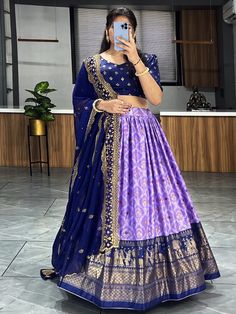 The upcoming wedding season calls for a truly mesmerizing outfit, and our fascinating lavender digital printed dola silk wedding lehenga choli is here to make a statement. Crafted with utmost care and attention to detail, this stunning lavender lehenga choli is the perfect pick for your festivals, weddings, occasions, and other events.
Featuring a lavender color dola silk material lehenga, this piece boasts a digitally printed design that adds a touch of elegance and uniqueness. The contrast foi Traditional Lehenga, Chaniya Choli Designs, Mirror Work Lehenga, Simple Lehenga, Half Saree Lehenga, Long Gown Design, Lehenga Designs Simple, Blue Lehenga, Half Saree Designs