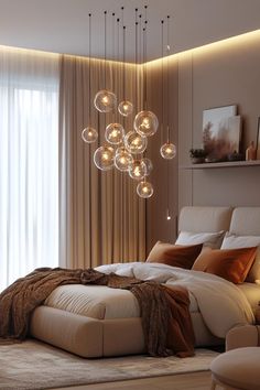 a bedroom with a large bed and lots of lights hanging from the ceiling