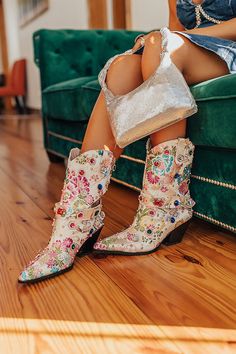 Boot Height: 11.5 Inches Heel Height: 3 Inches For a more comfortable fit, we recommend ordering a 1/2 size down from what you typically wear. For example, if you normally wear a size 7.5, we recommend ordering a size 7. Cowboy Boots Wedding, Red Cadillac, Maximalist Outfits, Cowgirl Era, Wedding Cowboy Boots, Bota Western, Botas Western, Statement Shoes, Pinterest Ideas