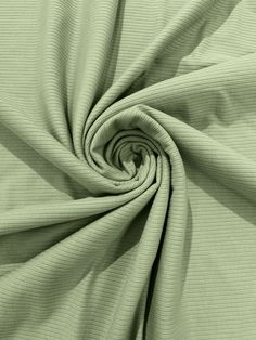 a close up shot of the fabric in light green color, with very thin lines on it