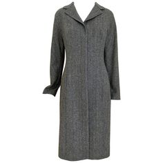 90s Dolce Gabbana Herringbone wool coat lined in silk. fit size 4/6. Marked size 42 italian Classic Long Outerwear For Evening, Classic Long Evening Outerwear, Classic Fitted Wool Coat For Evening, Fitted Long Wool Business Coat, Fitted Long Wool Coat For Business, Classic Evening Wool Coat, Fitted Notch Lapel Wool Coat For Evening, Fitted Long Wool Coat For Work, Designer Fitted Long Wool Coat