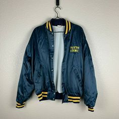 Vintage Notre Dame Varsity Bomber Jacket. Pre-owned. Fits like a small-medium. Inside tag was removed before but I wear medium usually and this is smaller than normal mediums. Retro Blue Outerwear With Letter Print, Blue College Style Outerwear For Streetwear, Blue Outerwear With Letter Print For Outdoor, Blue College Style Outerwear For School, Casual Blue Outerwear For College, Blue College Track Jacket With Pockets, Casual Navy Outerwear With Letter Print, Blue Casual Varsity Jacket For Outdoor, Casual Blue Varsity Jacket For Outdoor