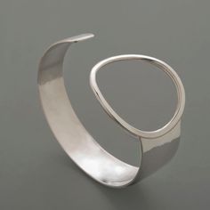 Modern Hammered Cuff Bangle, Modern Sterling Silver Open Cuff Bangle, Modern Hammered Cuff Jewelry, Modern Wide Band Bangle With Polished Finish, Modern Hammered Bangle, Modern Hand Forged Bangle Jewelry, Minimalist Open Band Cuff Bracelet, Modern Hand Forged Bangle, Modern Adjustable Hand Forged Bangle