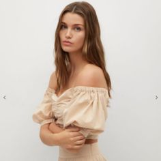 100% Cotton, Cotton Poplin, Gathered Details, Off-Shoulder Design, Cropped Design, Straight Neck, Puffed Short Sleeve, Concealed Zip Fastening On The Back Casual Puff Sleeve Off-shoulder Top For Day Out, Casual Off-shoulder Puff Sleeve Top For Day Out, Beige Off-shoulder Top For Day Out, Chic Summer Off-shoulder Top With Elastic Shoulders, Chic Neutral Crop Top For Spring, Chic Beige Off-shoulder Top For Spring, Chic Neutral Crop Top For Summer, Elegant Brown Crop Top For Summer, Mango Cream