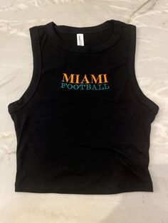 Embroidered tank top Sporty Tank Top For College In Summer, Sporty Summer Tank Top For College, Cotton Tank Top For College In Summer, Summer Game Day Tank Top, Casual Summer Tank Top For College, Casual Tank Top For Game Day In Summer, Casual Summer Tank Top For Game Day, Collegiate Cotton Tank Top For College, Casual Sleeveless Tank Top For College