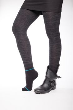 Cozy sweater tights with wool socks attached. Perfect for layering for skiing (wear them as base wear for outdoor sports). Wool keeps feet dry and warm. Multi-use - for fashion and sport. Features Attached ankle wool sock works with all boot styles Provides natural moisture management and temperature regulation Unique Free Run pattern keeps you stylish and toasty warm Wear as base layer to add texture and pattern to any outfit Benefits Luxury legwear meets wool performance sock for the ultimate Sporty Knee-high Socks For Winter, Sporty Knee-high Winter Socks, Winter Compression Full-length Tights, Winter Compression Full Length Tights, Winter Full Length Compression Tights, High Stretch Casual Winter Tights, Casual High Stretch Winter Tights, Full-length Compression Legwear For Winter, Winter Compression Casual Tights