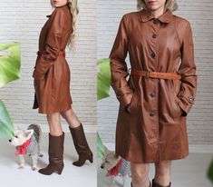 "➳ Gorgeous Danier Leather designer trench jacket ➳ Warm, caramel brown leather ➳ Ultra soft and buttery texture with a comfy fit ➳ Hidden inner chest pocket ➳ Belt loops at side ➳ Button down front closures ➳ Fully lined ➳ Jacket did not come with a belt, just belt loops. We included a 1970's tooled leather belt as it looks great styled with the coat      but the belt is interchangeable or looks great without a belt, if desired.  ➳ Dry cleaned, leather treated and ready to wear  Measurements Brown Business Outerwear For Fall, Brown Outerwear For Business In Fall, Brown Buttoned Outerwear For Office, Brown Office Outerwear With Buttons, Brown Long Coat For Office, Brown Leather Outerwear For Work, Brown Outerwear With Button Closure For Office, Brown Leather Jacket With Buttons For Fall, Vintage Brown Long Sleeve Outerwear For Fall