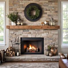 a living room with a fire place in the center and lots of decorations on the mantle