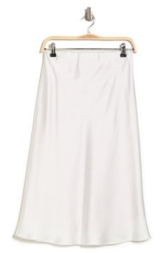 Elevate your wardrobe with this pull-on bias satin midi skirt for elegant, feminine style. 31" length (size S) Elasticized waist Pull-on style Satin construction 97% polyester, 3% spandex Machine wash cold, line dry Made in USA Model’s stats for sizing: 5’10” height, 34” bust, 27” waist, 35” hips. Model is wearing size S. Spring Formal Satin Maxi Skirt, White Satin Skirt For Summer, Flowy Satin Skirt With Bias Cut, Classic Silk Midi Skirt, Elegant Bias Cut Midi Skirt, Relaxed Bias Cut Midi Skirt, White Midi-length Bottoms For Evening, White Midi Length Bottoms For Evening, Chic White Silk Maxi Skirt