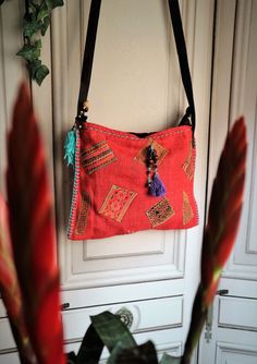 "Vintage Ethnic Shoulder Bag! In Mint condition!! This bag is made by fabric and leather materials. Zipper Working. Lining Black cotton! Measures: 12.6\" x 9.44\" (32 cm x 24 cm) Strap: 44.88\" (114 cm) Thanks for stopping by!!" Handmade Red Hobo Bag For Travel, Traditional Red Bags With Leather Handles, Red Leather Handle Pouch Shoulder Bag, Red Bohemian Pouch Shoulder Bag, Red Embroidered Travel Bag, Red Pouch Shoulder Bag For Festivals, Red Embroidered Hobo Tote Bag, Traditional Red Bag For Everyday Use, Red Embroidered Tote Shoulder Bag