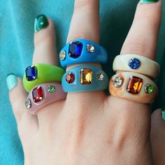 This is the Chunky Crystal Collection 🔮, made up of 6 gorgeous rings. Make sure that you choose your band color&style from drop down menu and check the size from here. Band colours&sizes: *Pink (US 7, 17mm) *Blue (US 7, 17mm) *Green (US 6, 16mm) *Baby Blue (US 8, 18mm) *Beige with Blue Crystal (US 8, 18mm) *Beige with Orange Crystal (US 8, 18mm) 📬 UK Shipping : FREE 📢 Free delivery on orders 35 USD and up to US buyers 📢💓 Vintage Multicolor Rings For Party, Trendy Blue Party Ring, Trendy Green Rings For Party, Trendy Blue Ring For Parties, Tri Color Ring, Thick Band Ring, Ring Y2k, Ring Party Jewelry, Crystal Uses