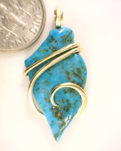 14.47ct Arizona Blue Turquoise in 14kt Gold Art Wrap Pendant  14.47 carats total weight   CHECK OUT OUR OTHER AUCTIONS AND EBAY STORE!!! Total weight 14.47 carats including wrap Size 32 mm by 15 mm by 6 mm including wrap   Up for sale is a beautiful and unique piece of  Sleeping Beauty Arizona Turquoise in a neat freeform shape artfully wrapped in a tension forged 14kt gold wire wrap. It is a wonderful vibrant blue color that will be a spectacular highlight to any outfit. This is an American mined stone and is all natural no dyes or coloring. To top it off are the glowing waves of 14kt gold securely grasping the stone and setting it off to perfection. DO NOT LET THIS ONE SLIP AWAY!! Wire wrapping or Wire sculpture is one of the oldest techniques for making jewelry by hand. But, the use of Wire Wrapped Gemstone Jewelry, Purple Choker, Wire Wrapped Turquoise, Meteorite Jewelry, Wire Wrapped Stone Jewelry, Wire Wrap Jewelry Designs, Artisan Jewelry Necklaces, Boulder Opal Pendant, Wire Wrapping Stones