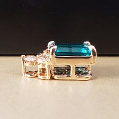 "Emerald Pendant Custom made in all 14k 🌹 Rose Gold, set with three sparkling Genuine Diamonds totaling .38cts. Featuring a Beautiful Lab Grown Emerald measuring in at 9X7mm all set prong style with a hidden bail. A unique twist on a timeless design, perfect for layering with your favorite pendants. **.38ct of Natural Diamonds **This listing is for the pendant only. **Emerald is the official May Birthstone and Diamond is the official April Birthstone. Please feel free to contact me anytime, if Formal Rose Gold Three Stone Jewelry, Rose Gold Emerald-cut Cubic Zirconia Jewelry, Rose Gold Three Stone Jewelry For Gift, Rose Gold Three Stone Jewelry Gift, Rose Gold Three Stone Jewelry As A Gift, Fine Jewelry In Rose Gold With Three Stones, Emerald Cut Rose Gold Jewelry With Birthstone, Rose Gold Three Stone Fine Jewelry, Fine Rose Gold Three Stone Jewelry