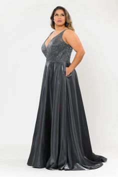 Dance the night away in this plus size long embroidered bodice dress with shimmer satin skirt by Poly USA W1032. Made out of satin, this beautiful gown features a sleeveless V-neck bodice adorned with beaded embroidery, convenient side pockets, open back, floor length A-line skirt with sweep train, and a zipper closure Plus Size Gala Dress, Plus Size Gowns, Embroidered Bodice, Bodice Dress, Senior Prom, Bridesmaid Dresses Plus Size, Illusion Dress, Women's Evening Dresses, Gala Dresses