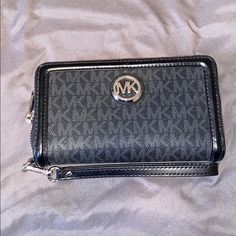 Never Used In Great Condition!!!! Michael Kors Wallet With Mobile Phone Bag, Michael Kors Black Wallet For Everyday Use, Michael Kors Black Everyday Wallets, Néonoé Mm, Brown Michael Kors Wallet With Zipper Closure, Nike Long Sleeve, Michael Kors Travel Wallets With Gold-tone Hardware, Large Wallet, Black Leather Wallet