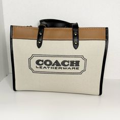 Comes With Dust Bag For Storage. Polished Pebble Leather Inside Zip Pocket Snap Closure, Fabric Lining Handles With 5 1/2" Drop Detachable Strap With 24 1/2" Drop For Shoulder Or Crossbody Wear Four Protective Feet At Base 11 3/4" (L) X 9" (H) X 6" (W) Coach Zip Top Tote, Coach Tote Bags, Grey Tote, Carryall Tote, Polished Pebble, Satchel Tote Bag, Coach Tote, Bags Coach, Blue Tote