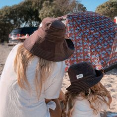 A wide brim corduroy bucket sun hat for sun lovers and sunny day fun. This sun hat for women has a nice wide brim to protect your whole face and even your neck and chest. Pack it in your bag, it folds up easy. This hat is made from a dark brown cotton corduroy fabric. Inside liner is white cotton. I used interfacing inside the brim to keep it's shape. Brim measures 4.5" Crown depth is 3.5". Contact me for custom fit option. SIZES AVAILABLE S - measures 22.5" (fits heads with circumference of 21" Adjustable Bucket Sun Hat For Everyday, Adjustable Sun Hat With Uv Protection For Everyday, Adjustable Uv Protection Sun Hat, Adjustable Summer Bucket Hat For Everyday Wear, Adjustable Summer Bucket Hat For Everyday, Adjustable Outdoor Bucket Sun Hat, Brown Bucket Hat For Beach Season, Brown Brimmed Bucket Hat With Upf 50+, Brown Uv Protection Bucket Hat