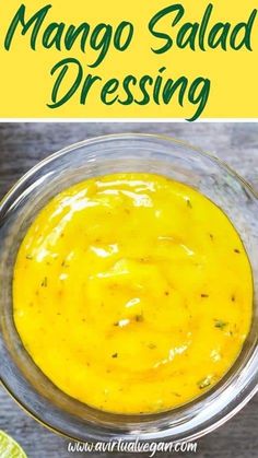 mango salad dressing in a glass bowl with limes on the side and text overlay