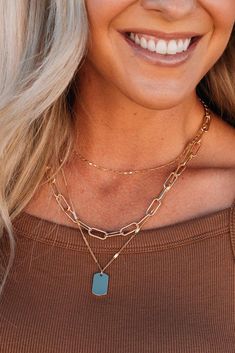 Three layer delicate and chunky chain necklace with smooth tag pendant. Made of alloy and base metal. Shiny gold plating. Size: 16- 18- 21" Chain lengths 3" extender Lead, Nickel, Cadium Compliant Lobster claw closure with extension chain Ships from the USA by 3 pm MST Monday - Friday Limited stock based on vendor availability. Chunky Chain Necklace, Layered Chain Necklace, Layered Chain, Chunky Chain Necklaces, Layered Chains, 3 Pm, Three Layer, Monday Friday, Limited Stock