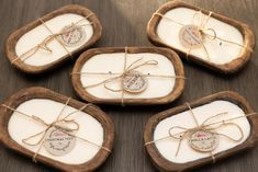 four wooden coasters tied with twine on a table