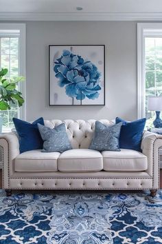 a living room with blue and white decor