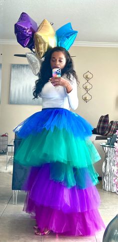 Bright! Colorful! Dramatic! Full layer tulle skirt. Stretchy waist. This skirt it perfect for special occasions.  Medium  **Birthday Hat available on site** Tiered Tulle Skirt For Costume Party, Blue Tulle Petticoat For Party, Green Tulle Party Tutu Dress, Green Tulle Tutu Dress For Party, Purple Party Tulle Petticoat, Party Multicolor Tiered Skirt, Multicolor Tiered Skirt For Party, Green Tulle Skirt For Party, Purple Tulle Petticoat For Party