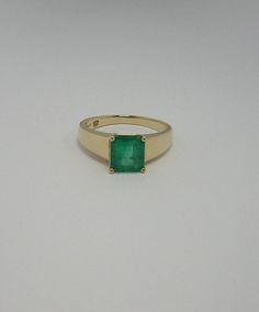 "Colombian Emerald Ring Set in 14K Gold 1 Natural Emerald Cut Emerald / Size ~ 1.65 Carats Color ~ Medium Green / Clarity ~ Type 3 Metal Purity ~ 14k Yellow Solid Gold / Weight ~ 3.66 Grams Precious ~ Classic ~ Timeless Finger (7 1/4 ) U.S.A and Canada (Sizable) Inquire about sizing cost ( 0 ) United Kingdom, Ireland, Australia, New Zealand ( - ) India, China, Japan, South America (15 ) Italy,Spain,Netherlands,Switzerland Measurements Inside Diameter ~ 17.53 mm - 0.69 Inches Inside Circumference 14k Gold Emerald Ring With Princess And Brilliant Cut, 14k Gold Emerald Ring Princess Cut, Classic Gia Certified Emerald Cut Gemstones, Classic Emerald Cut Gemstones For Anniversary, Gia Certified Baguette Cut Emerald Ring In 14k Gold, Gia Certified Yellow Gold Emerald Ring For Formal Occasions, Formal Gia Certified Yellow Gold Emerald Ring, Classic Brilliant Cut Emerald Gemstones, Classic Brilliant-cut Emerald Gemstones