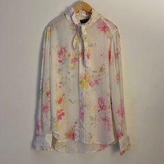 New Polo Ralph Lauren White Floral Long Sleeve Blouse. Size 2 & 8. Button Down. 100% Silk. Spring Tie Neck Tops With Button Closure, Spring Daywear Blouse With Button Closure, Feminine Spring Blouse With Buttons, Spring Button Closure Blouse For Daywear, Feminine Spring Blouse With Button Closure, Spring Tie Neck Top With Button Closure, Feminine Formal Blouse With Floral Print, Feminine Blouse With Button Closure For Daywear, Spring Daywear Blouse With Buttons