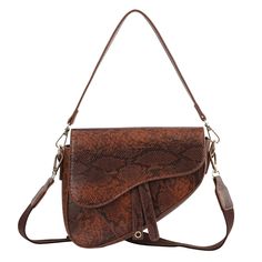 PRICES MAY VARY. Trendy saddle bags feature durable crocodile textured patent leather material, magnetic button closure with an interior zipper and includes two different style detachable straps to fit your style Bag Measurements: 8.8"(L)*2.2"(W)*6.8"(H) / 22.5cm(L)*5.5cm(W)*17.5cm(H) - Short handle strap measures 15" in length - Long shoulder strap measures 29" at its shortest and extends up to 45" Versatile saddle purses can be worn many different ways - wear the short strap over the shoulder, Luxury Calf Leather Bags With Gunmetal Hardware, Saddle Handbags, Crocodile Handbags, Bag Measurements, Leather Crossbody Purse, Small Wallet, Crossbody Purse, Black Handbags, Leather Material