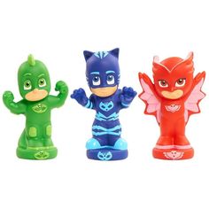 three small plastic figurines in the shape of cartoon characters, each with different colors