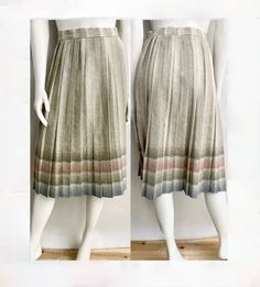 "Vintage 70's Cream, Plaid, Wool Blend, Pleated Skirt (XS) This Ladies Skirt comes in a cream polyester/wool blend, with a colorful bottom hem in pink, green, tan and blue with pleats, a fitted waistline, button closure that goes down the left side of the skirt and comes just at the knee length. The fabric is medium weight, is not lined, without stretch and has a matte surface. Wool/Polyester Blend Made in USA *This skirt is in excellent condtion. Size: (XS) Modern Day 0 Waist: 24\" Length: 28 1/2\" Hips: free Weight: 14 oz *Follow FreshandSwanky on Instagram" Vintage Cream Lined Skirt, Retro Beige Lined Skirt, Retro Beige Skirt, Retro Beige Skirt For Spring, Vintage Style Lined Beige Skirt, Vintage Multicolor Skirt For Fall, Vintage Beige Lined Skirt, Spring Wool Beige Bottoms, Beige Wool Bottoms For Spring