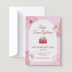 a pink and white birthday card with a cake on it's front, surrounded by flowers