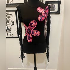 This Top Has A Stretchy Sheer Mesh Construction, Trippy Floral Appliques On The Front, Long Sleeves With Cut Out Detailing, And A Lettuce Trim. Edgy Pink Tops For Spring, Fitted Black Rave Tops, Fitted Pastel Goth Tops, Fitted Rave Tops For Spring, Pink Floral Print Top For Night Out, Edgy Pink Tops For Party, Pink Y2k Festival Tops, Pastel Goth Pink Long Sleeve Top, Edgy Pink Party Tops