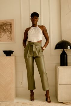 Get ready to make a statement in these beautiful olive green coloured pants. High waisted with pockets and an adjustable front tie to add your own flare of fierceness to your look! Our Sasha pants are perfect for your spring wardrobe and can be paired with a lovely blouse and accessories to compliment. *Accessories and top are not included Fabric: Faux leather, 55% Cotton 45% PU Model is wearing size small Shipping: ﻿Please visit our shipping policy for more information Magic Pants, Peach Clothes, Green Outfits, Olive Pants, Pants High Waisted, Outfit Pink, Colored Pants, Pants Large, Green Outfit