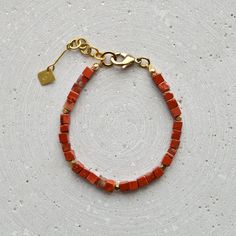 Simple unisex gemstone bracelet with Red Jasper cubes or a natural stone of your choice (see drop-down menu). The design is deliberately kept simple and makes a wonderful gift for a best friend. The gemstones are natural products. Each stone and each pearl is slightly different, which gives this piece of jewelry its special charm. LENGTH The total length is approximately 20 cm and, thanks to the extension chain, fits best on wrists between 16-18 cm in circumference. If you need a different lengt Modern Gemstone Beaded Bracelets For Gift, Modern Gemstone Beaded Bracelets As Gift, Modern Gemstone Beads Bracelet For Gift, Modern Beaded Bracelets With Natural Stones For Gift, Minimalist Natural Stone Beaded Bracelets For Everyday, Modern Adjustable Gemstone Beaded Bracelets, Modern Beaded Bracelets With Natural Stones, Red Minimalist Beaded Bracelets For Everyday, Minimalist Red Beaded Bracelets For Everyday