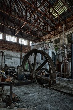 an old factory with lots of machinery in it