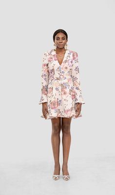 Elevate your style with our Lita Floral Long Sleeve Mini Dress. a timeless piece that seamlessly combines sophistication and charm. Adorned with a delicate floral pattern. this dress offers a touch of femininity and grace. Its long sleeves provide an air of elegance and versatility. making it perfect for a variety of occasions. Invisible zip closuretrumpet sleevedry cleanItem measurements have been rounded to the nearest cm.This garment fits true to sizeModel is 5'9.5"/178 cm. bust 32''/82cm wai Elegant Long Sleeve Floral Dress With Ditsy Print, Elegant Spring Floral Dress With Rose Print, Elegant Floral Dress For Spring Daywear, Feminine Floral Dress For Daywear, Elegant Floral Print V-neck Dress, Elegant A-line Floral Dress For Daywear, Feminine Floral Dress With Ruffle Hem For Daywear, Feminine Mini Dress With Rose Print, Feminine Mini Length Rose Print Dress