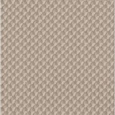 an up close view of a beige carpet with wavy lines on the bottom and sides