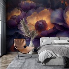 a bed room with a neatly made bed and a flower wall mural on the wall