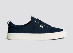 OCA Low Navy Canvas Sneaker Women Sporty Navy Cotton Sneakers, Everyday Canvas Sneakers With Speckled Midsole, Navy Sporty Canvas Shoes With Vulcanized Sole, Sporty Navy Canvas Shoes With Vulcanized Sole, Navy Canvas Sneakers With Rubber Sole, Navy Low-top Canvas Sneakers, Navy Canvas Low-top Sneakers, Everyday Low-top Canvas Shoes With Gum Sole, Everyday Cotton Sneakers With Textured Sole