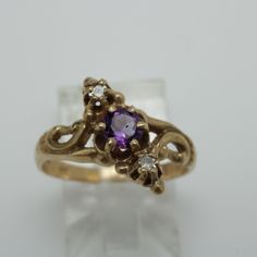 Victorian Amethyst Diamond Ring 14k Gold Size 6 14k Yellow Gold Size 6 can be sized at a low cost  The Ring is 12.5mm across by 4.2mmin Height  Diamond 0.08ct total and Amethyst 0.30ctmm  Comes with a new gift box item # 5826 14k Gold Purple Ring With Diamond Accents, 14k Gold Purple Diamond Ring, Purple 14k Gold Ring With Diamond Accents, Formal Purple Diamond Birthstone Ring, Heirloom Purple Diamond Ring, Classic Amethyst Diamond Ring In Yellow Gold, Purple Diamond Ring In 14k Gold For Anniversary, Wedding Amethyst Ring With Diamond Accents In 14k Gold, Diamond Amethyst Ring In Yellow Gold For Anniversary