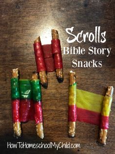 three small sticks made to look like people in the middle of a wooden table with text that reads scrolls bible story snacks how to homeschoolmychild