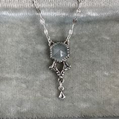 *Artisan all the way! *Hand forged elements in antique impression dies from the early 1900's *Solid recycled Sterling Silver *3 carat hexagon, step cut, natural Milky Aquamarine gemstone *18" total length necklace with radiant stamped specialty chain and lobster claw clasp *Pendant measures 1 1/4" drop length by 1/2" wide Hexagon Art, Length Necklace, Step Cut, Aquamarine Gemstone, 3 Carat, Lariat Necklace, Recycled Sterling Silver, Necklace Handmade, Hand Forged