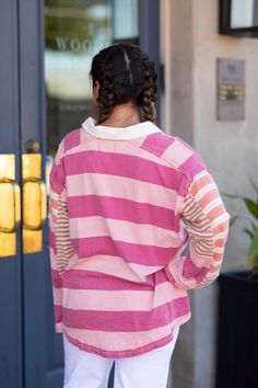 The ASTER STRIPE TEE offers a modern twist on the classic tee. Its oversized and provides a comfortable and stylish fit, while the unique design of different size stripes adds a touch of personality. Details + Fi Machine Wash cold Do Not Bleach Lay Flat To Dry Fits true to size Model is 5’7” and wearing size small Trendy Relaxed Fit T-shirt With Contrast Stripes, Oversized Sporty Tops With Contrast Stripes, Sporty Cotton Tops With Vertical Stripes, Trendy Relaxed Fit Top With Vertical Stripes, Oversized Horizontal Stripe Top For Fall, Sporty Tops With Striped Hem And Relaxed Fit, Sporty Relaxed Fit Top With Striped Hem, Oversized Trendy Top With Contrast Stripes, Trendy Oversized Tops With Contrast Stripes