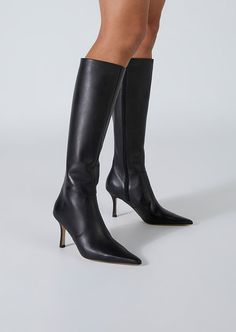 Introducing Shaq. Featuring a slender stiletto heel and pointed toe, this knee-high boot is bound to become your go-to this season and beyond. -Material: Leather -Sole: Rubber -Fit: True To Size -Toe-shape: Point -Features: Stiletto Heel -Heel: 8cm Leg Height x Calf Circumference x Opening Circumference 5 - 372mm x 348mm x 358mm 5.5 - 376.5mm x 353.5mm x 363.5mm 6 - 381mm x 359mm x 369mm 6.5 - 385.5mm x 364.5mm x 374.5mm 7 - 390mm x 370mm x 380mm 7.5 - 394.5mm x 375.5mm x 385.5mm 8 - 399mm x 381 Skin Tight Knee High Boots, Luxury Wide Calf Boots With Square Toe, Luxury Calf Hair Boots With Pointed Toe, Tony Blanco Boots, Stilletto Heel Boots, Point Toed Boots, Narrow Calf Boots Woman Slim Calves, Black Boots Heel, Wishlist Aesthetic