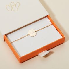 Carry a piece of their heart wherever you go with our Merci Maman x Mellipou Personalized Pastille Chain Bracelet. This timeless bracelet features an engraved Mellipou logo and the hand-engraved names and birth dates of loved ones for a mom to wear and adore. Each bracelet makes a perfect gift for a special mom to treasure.&nbsp;18K Champagne Gold Plated, 925 Sterling Silver or 18K Rose Gold PlatedChain length: 7, adjustable to 6.3Pastille charm: 0.6 x 0.6Engraved by hand in our workshopSent Gold Name Bracelet, Crystal Dice, Birth Gift, Meaningful Messages, Grandmother Gifts, Un Logo, Crystal Stars, Gifts For New Mums, Name Bracelet