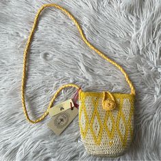 En Shalla Crochet “Bag 44l00” From Anthropologie Crossbody Hand-Crocheted Bucket Bag. Leather Braided Strap. Detailed Button Closure. Leather Label Inside. Crochet Bag. Woven Leather Shoulder Strap. Closure With Worked Button. Internal Leather Logo Label. 45% Dried Palm & 45% Nylon | 100% Lamb Leather Approx Size: 20 X 16 X 8 Cm (7.85” X 6.3” X 3.15”) | Strap Full Length: 110 Cm (43.3”) Born In Morocco & Bred In London New With Tags Retail: $138 Inventory: Mfeb*Mv Summer Yellow Crossbody Bag, Yellow Crochet Bucket Bag For Summer, Yellow Bucket Crochet Bag For Summer, Summer Yellow Bucket Crochet Bag, Yellow Handwoven Crochet Bag For Summer, Summer Yellow Handwoven Crochet Bag, Yellow Mobile Phone Bag, Rectangular, Yellow Bags With Removable Pouch For Summer, Yellow Pouch Bag For Travel