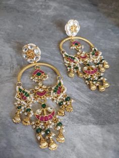 Tyaani inspired jewelry, sabyasachi jewelry, India Jewelry gold, kundan choker set, bollywood, india jewelry polki, jadau Jhumka earrings R O S H   J E W E L R Y Welcome to Rosh! Meet the freshly launched multi color Kundan Jhumka, attentively handcrafted  in India!    This Tyaani Inspired Jhumka has all the primary jewlery colors mixed to get the best look for that ethnic event! Pair it up with your best lehnga or Anarkali and spread magic! If you're a bride-to-be looking to add some very artis Temple Jewelry Style Jhumkas For Eid With Cutdana, Eid Temple Jewelry Style Jhumkas With Cutdana, Temple Jewelry Chandbalis For Eid Festivities, Temple Jewelry Bridal Earrings For Eid, Eid Temple Jewelry Jhumkas With Cutdana, Temple Jewelry Bridal Earrings For Festive Eid, Traditional Chandbali Tilla Jhumkas, Traditional Tilla Chandbali Jhumkas, Navratri Ceremonial Tilla Danglers