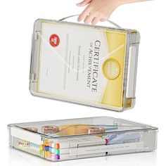 a person's hand reaching into a clear case